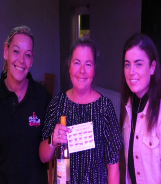 A full house winner celebrating during a Boogie Bingo game