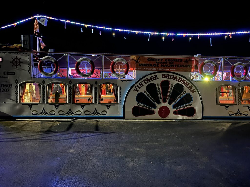 Fancy Dress Party DJ event on the Broads Tours Vintage Broadsman boat in Wroxham, decorated for a Spooky to Boogie themed cruise at night.