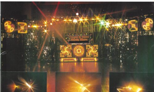 Vintage 1980s mobile disco setup by DJ Tim called The Tinsal 'N' Satin Music Show, featuring an authentic retro light show with a tinsel backdrop and starburst light effects on a wooden dancefloor.