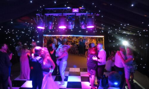 DJ hire Cambridgeshire venues — DJ Tim performing at a Cambridgeshire wedding in 2026