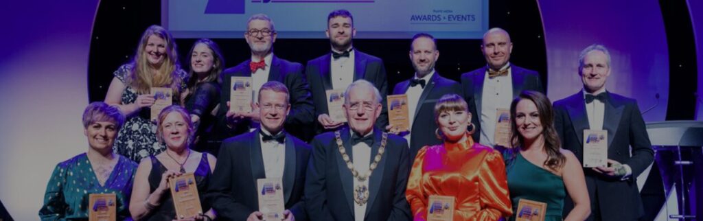DJ Tim of Mobile Disco Network celebrating 4th place for Customer Care at the King’s Lynn Mayor’s Business Awards 2025.