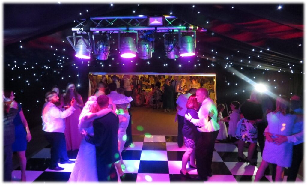 Wedding DJ cost 2026 East Anglia — DJ Tim's professional wedding setup at a Norfolk Suffolk Cambridgeshire Lincolnshire wedding venue