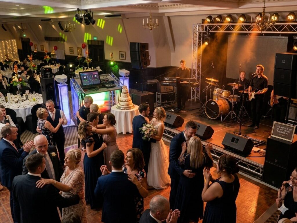 Trading Standards approved DJ Wedding entertainment East Anglia band live wedding band performing at a reception across Norfolk Suffolk showcasing the visual energy of live music
